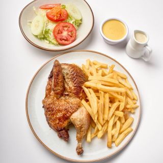 1/2 pollo con papas fritas